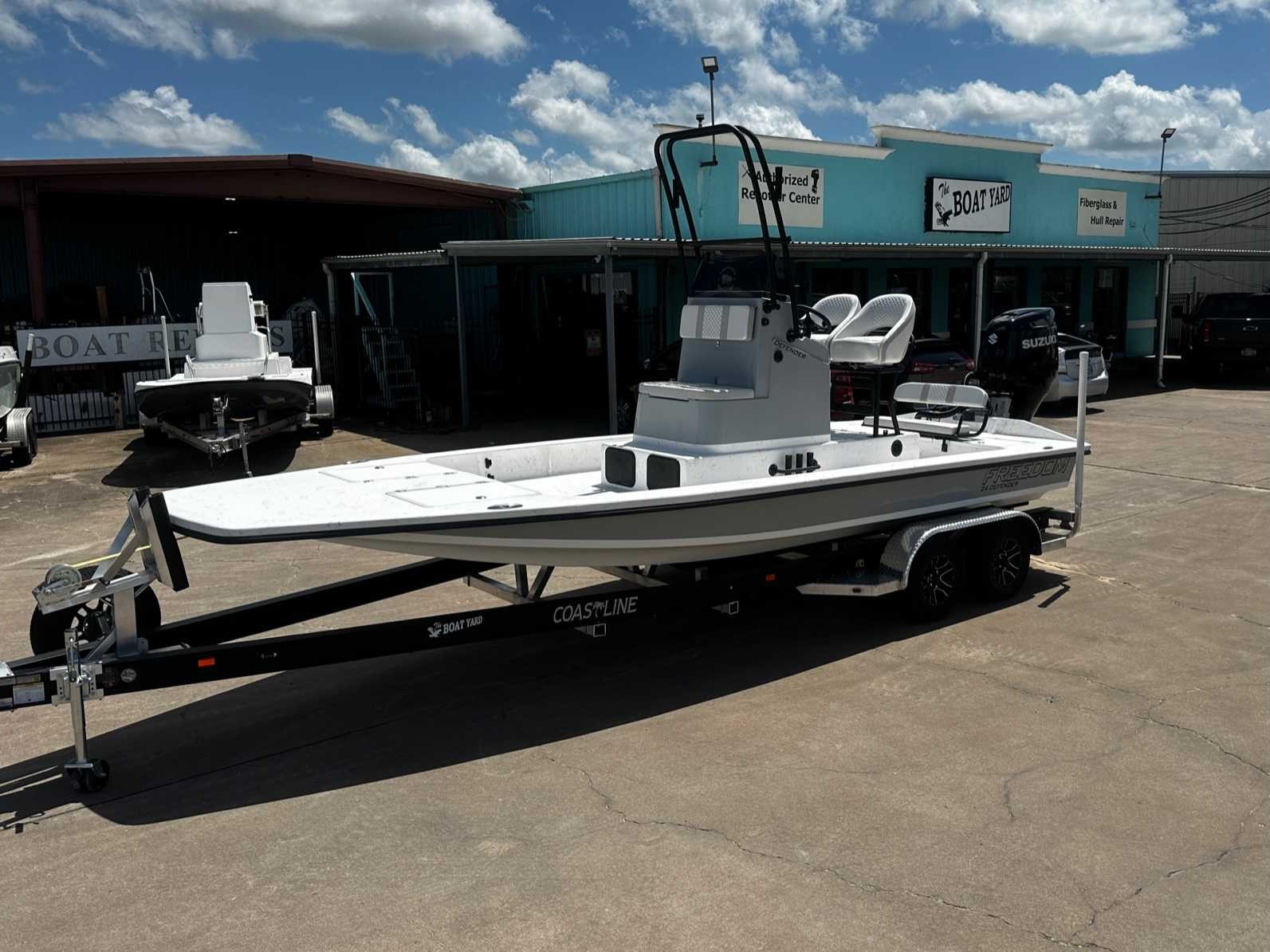 2027 Freedom Boats USA 24' Defender Fish Boat