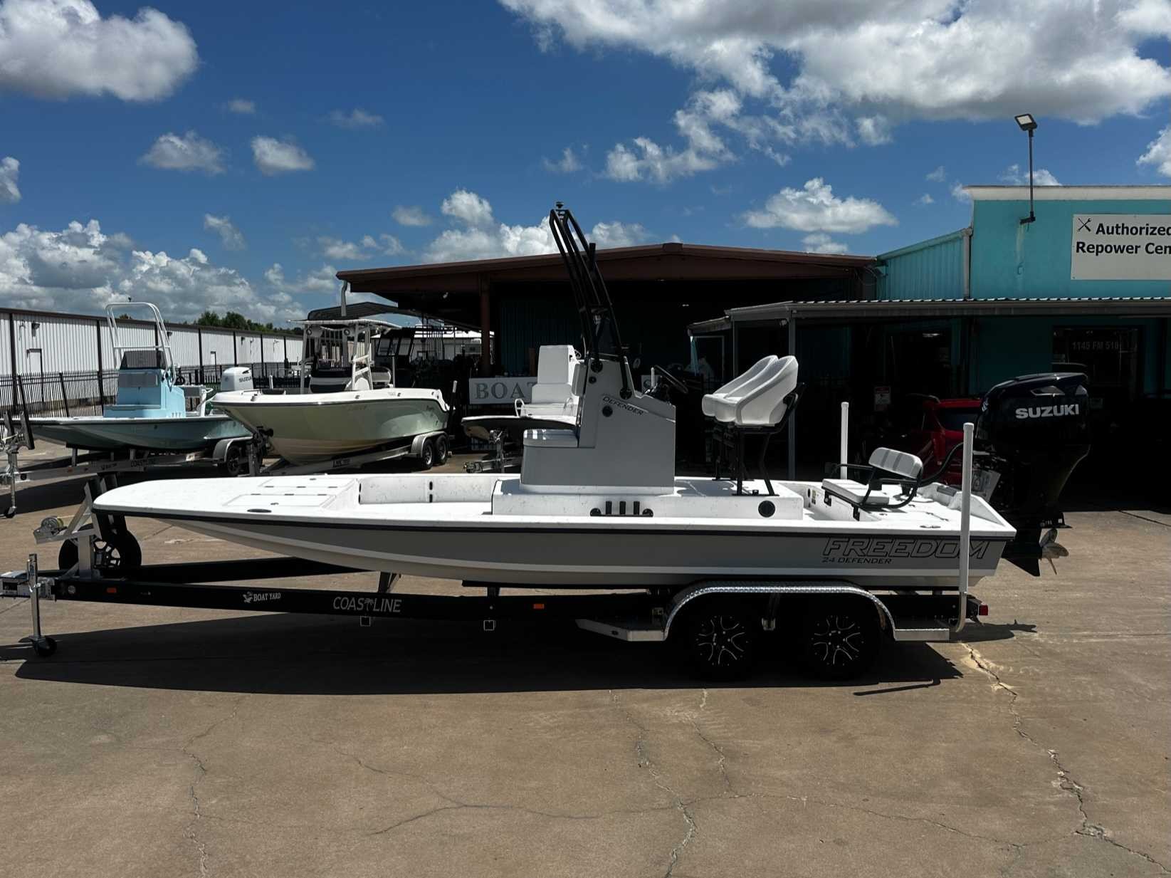 2027 Freedom Boats USA 24' Defender Fish Boat